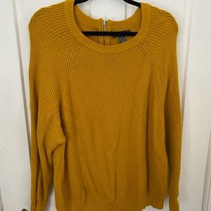 Mustard yellow sweater with zip in the back